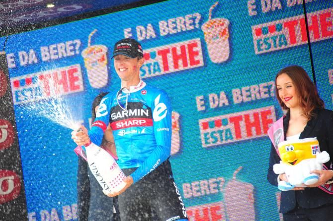 Ramunas Navardauskas (Garmin-Sharp) uncorks the bubbly after winning stage 11 at the Giro