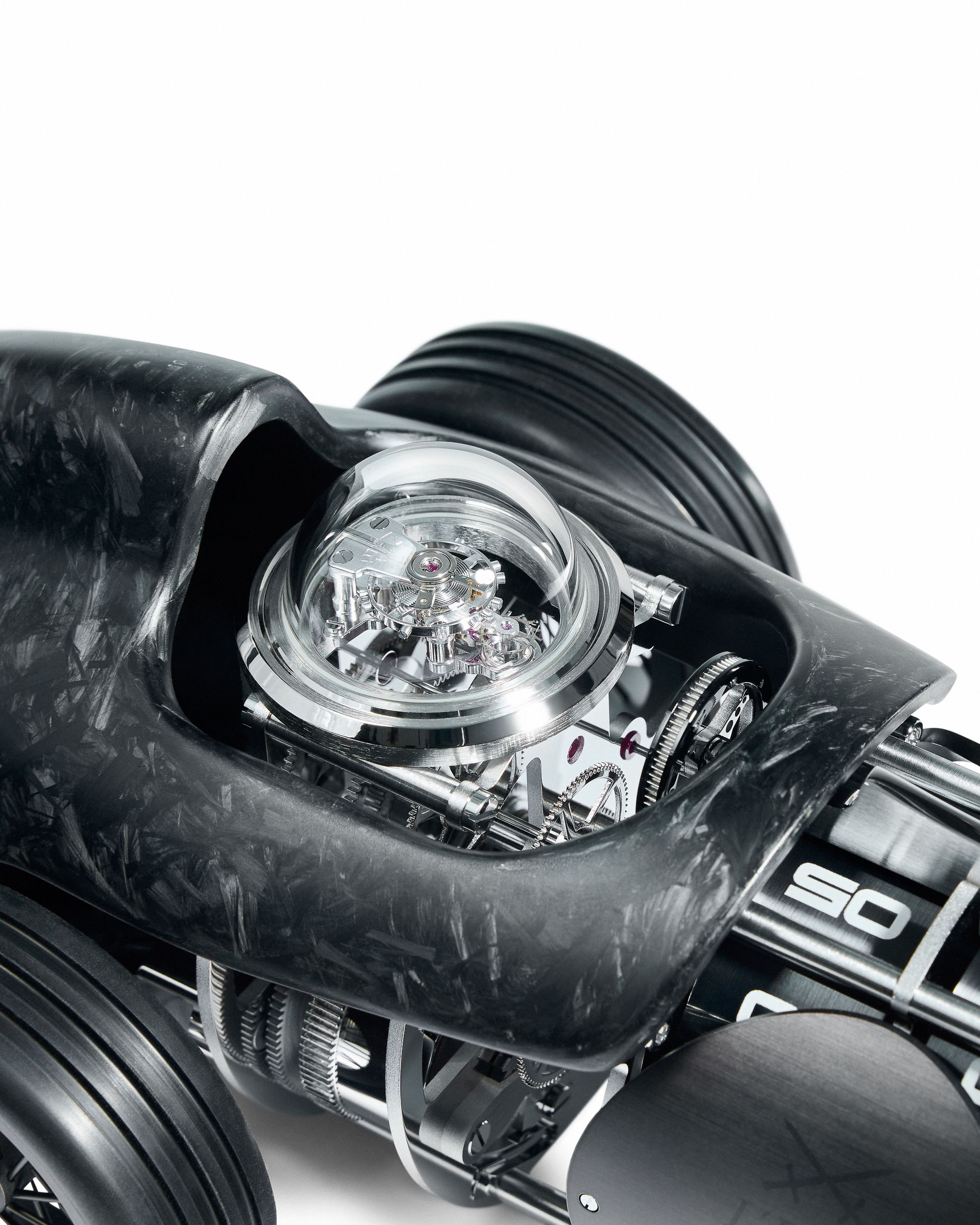 Clock workings inside body of racing car Bucherer Exclusives L’Epée 1839 kinetic sculpture