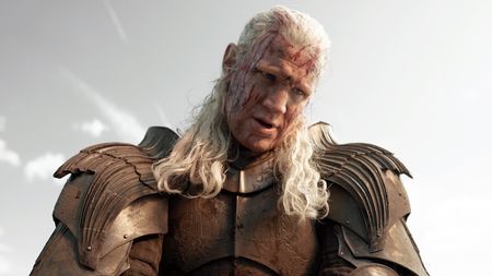 A bloodied Daemon Targaryen wearing his muddy armor in House of the Dragon season 3 episode 1