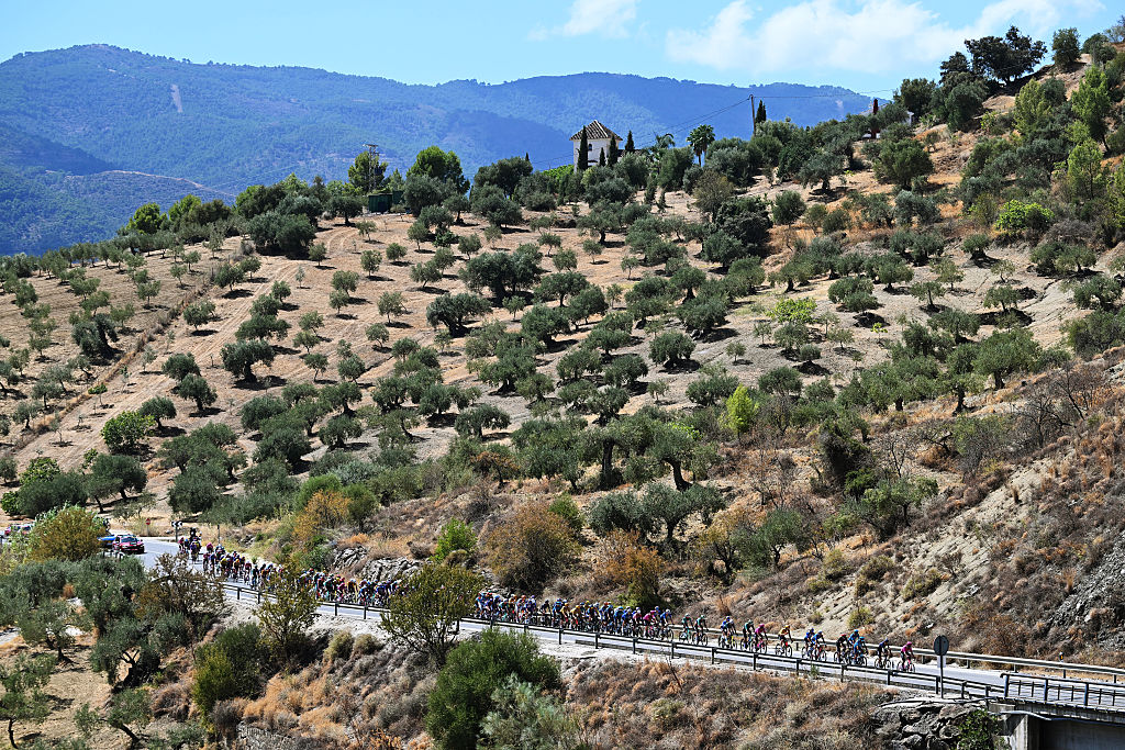 ESTEPONA&amp;#8203;, SPAIN - SEPTEMBER 11: A general view of the peloton passing through a landscape during the La Vuelta - 81st Tour of Spain 2026, Stage 19 a 210.8km stage from Velez-Malaga to Penas Blancas. Estepona 1274m / #UCIWT / on September 11, 2026 in Estepona, Spain. (Photo by Tim de Waele/Getty Images)