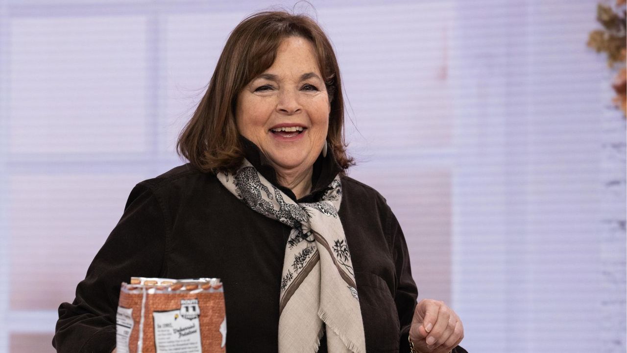 ina garten wearing a scarf on a purple background