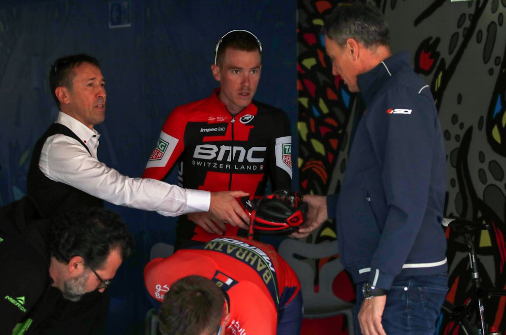 Rohan Dennis gets his equipment sorted before a ride at the Bahrain-Merida camp