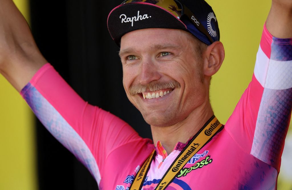 EF EducationEasypost teams Danish rider Magnus Cort Nielsen celebrates on the podium after winning the 10th stage of the 109th edition of the Tour de France cycling race 1481 km between Morzine and Megeve in the French Alps on July 12 2022 Photo by Thomas SAMSON AFP Photo by THOMAS SAMSONAFP via Getty Images