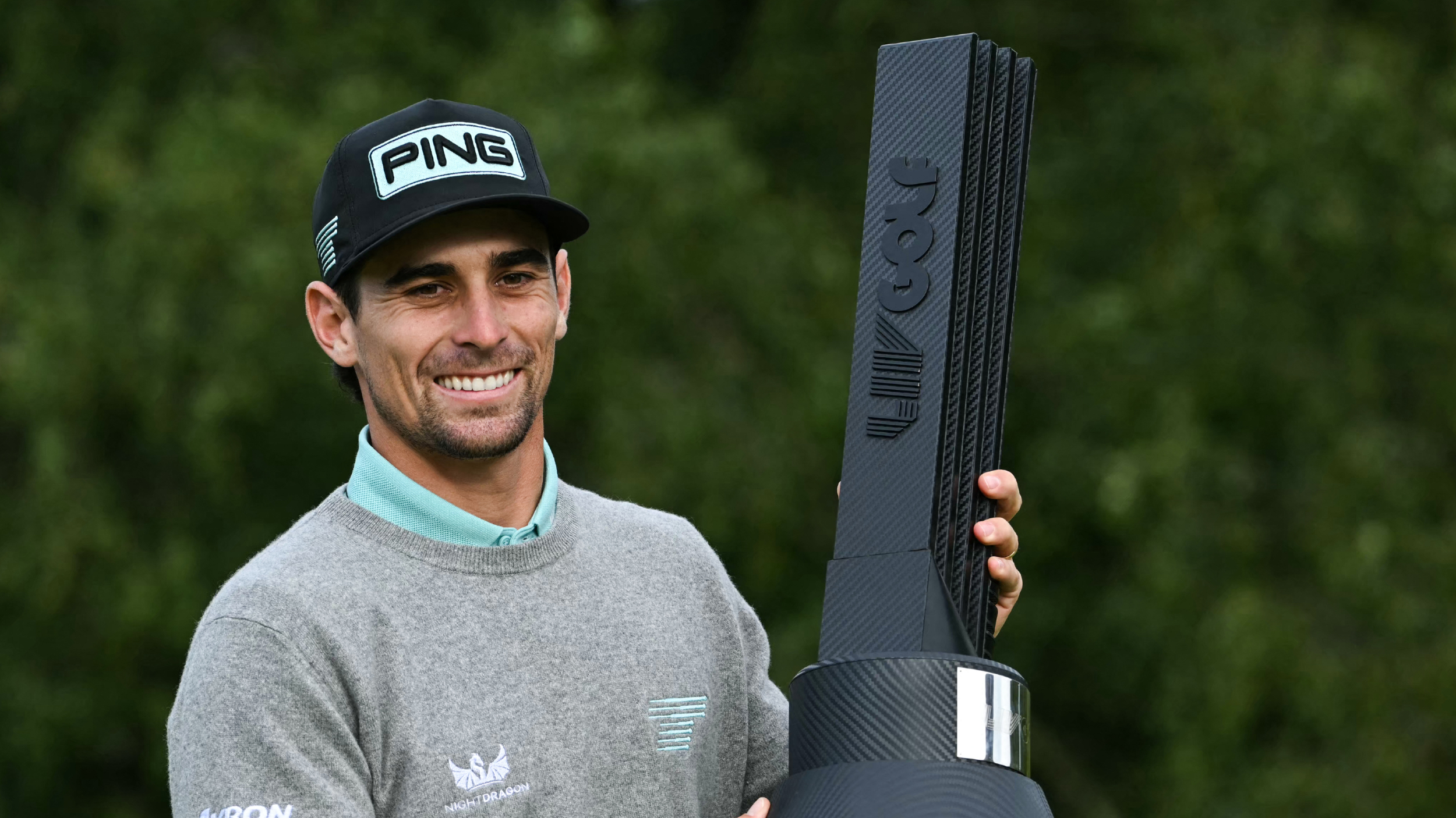 Joaquin Niemann with the LIV Golf UK trophy
