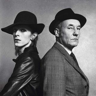 David Bowie posing for a photograph with American novelist William Burroughs