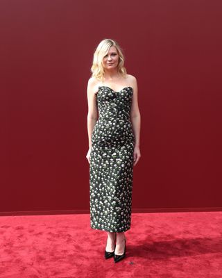 MILAN, ITALY - SEPTEMBER 20: Kirsten Dunst attends the Gucci Women's Spring Summer 2025 Fashion Show during the Milan Fashion Week Womenswear Spring/Summer 2025 at Triennale di Milano on September 20, 2024 in Milan, Italy. (Photo by Vittorio Zunino Celotto/Getty Images for Gucci)