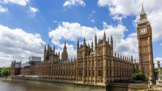 The UK Parliament building on a sunny afternoon