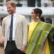 Prince Harry and Meghan Markle take part in a tour of Nigeria for the 10th anniversary of the Invictus Games