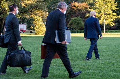 President Trump walks to Marine One.