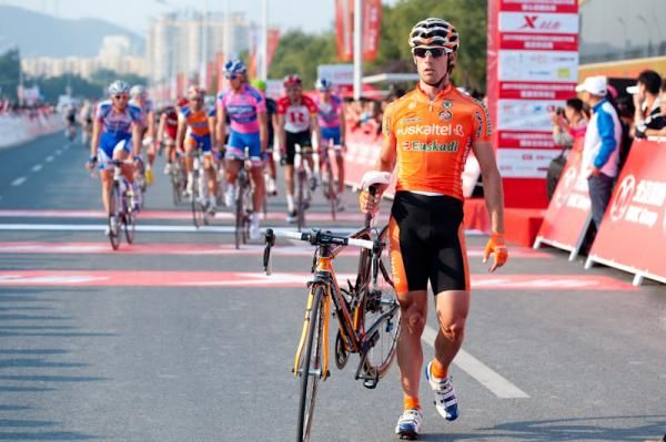 Mikel Nieve makes his way over the line