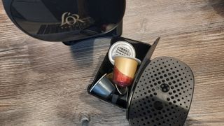 Used coffee capsules are stored in the L'OR Barista