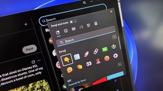 A computer interface shows an open emoji and GIF selection sidebar, overlaying a dark-themed app. Colorful emojis are featured on a sleek digital screen.