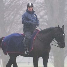 Ex-Prince Andrew rides on his horse during a foggy morning in Windsor