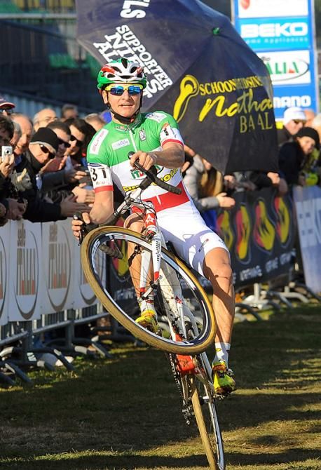 Runner-up Gioele Bertolini (Italy) crosses the finish line in style.