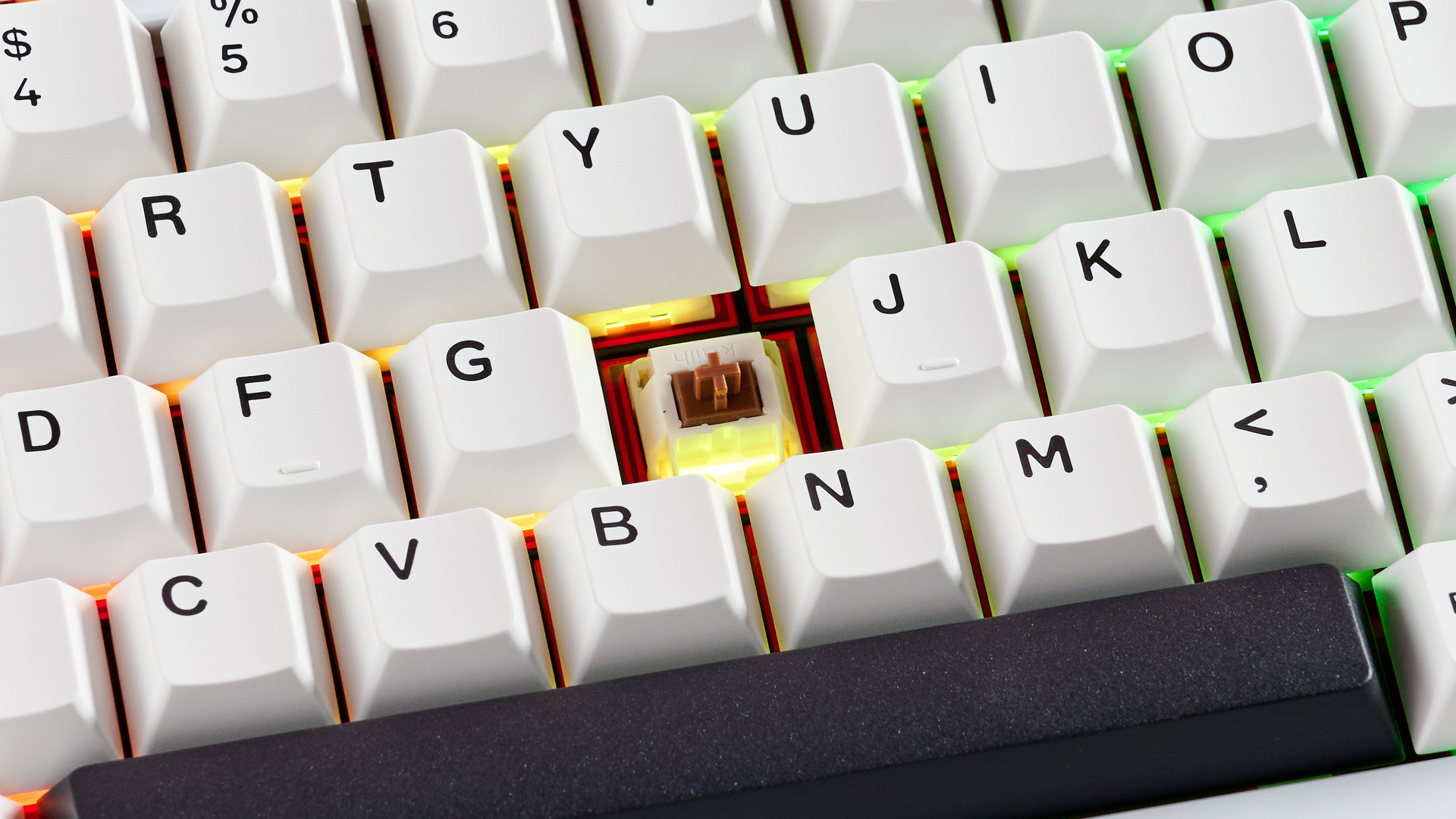 Close-up of Cocoa switch underneath keycap on Wobkey Rainy 75 Pro, with RGB lighting on