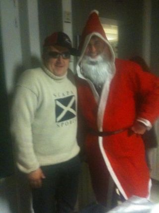 Santa Claus visits the Euro 'Cross Camp house.
