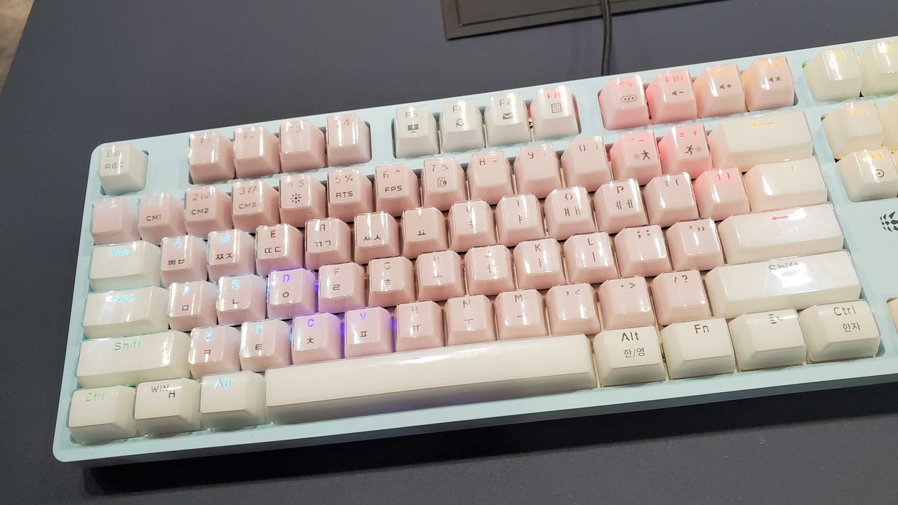 pink and blue keyboard with backlight