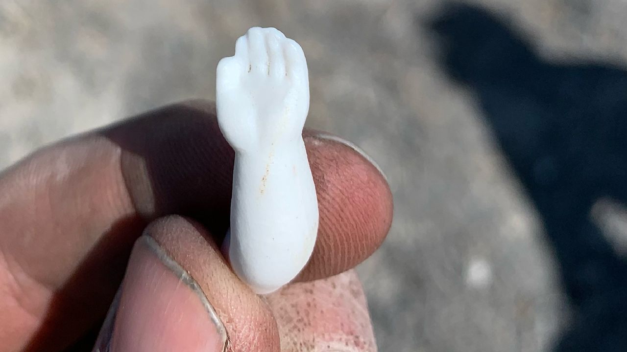 A tiny arm from a figurine found in Terrace. Archaeologists found between 10,000 and 20,000 artifacts at the ghost town site, which was abandoned by 1904. The remote location and the desert environment have protected these artifacts at the surface, though large materials like railroad ties were hauled away for scrap by the 1940s.