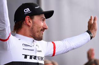 Fabian Cancellara waves from the podium at Flanders for one final time