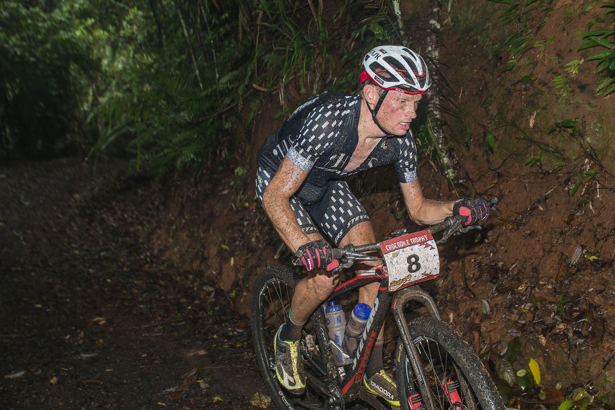 Soren Nissen on the steep climbs onto the Atherton Tablelands - today racers faced wet and muddy conditions early in the race