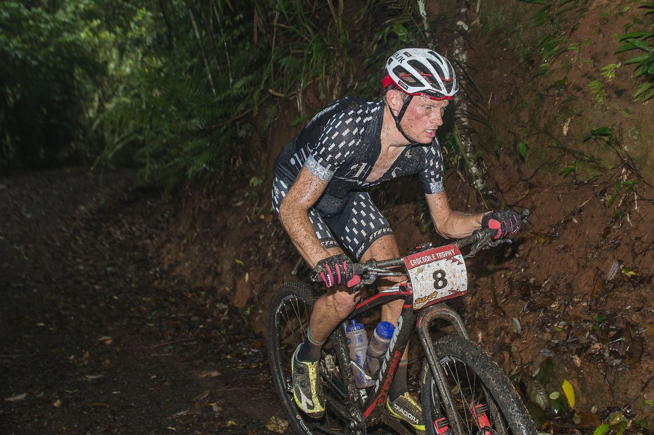 Soren Nissen on the steep climbs onto the Atherton Tablelands - today racers faced wet and muddy conditions early in the race