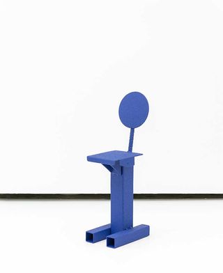 A blue chair by Philippe Malouin, made using found steel parts.
