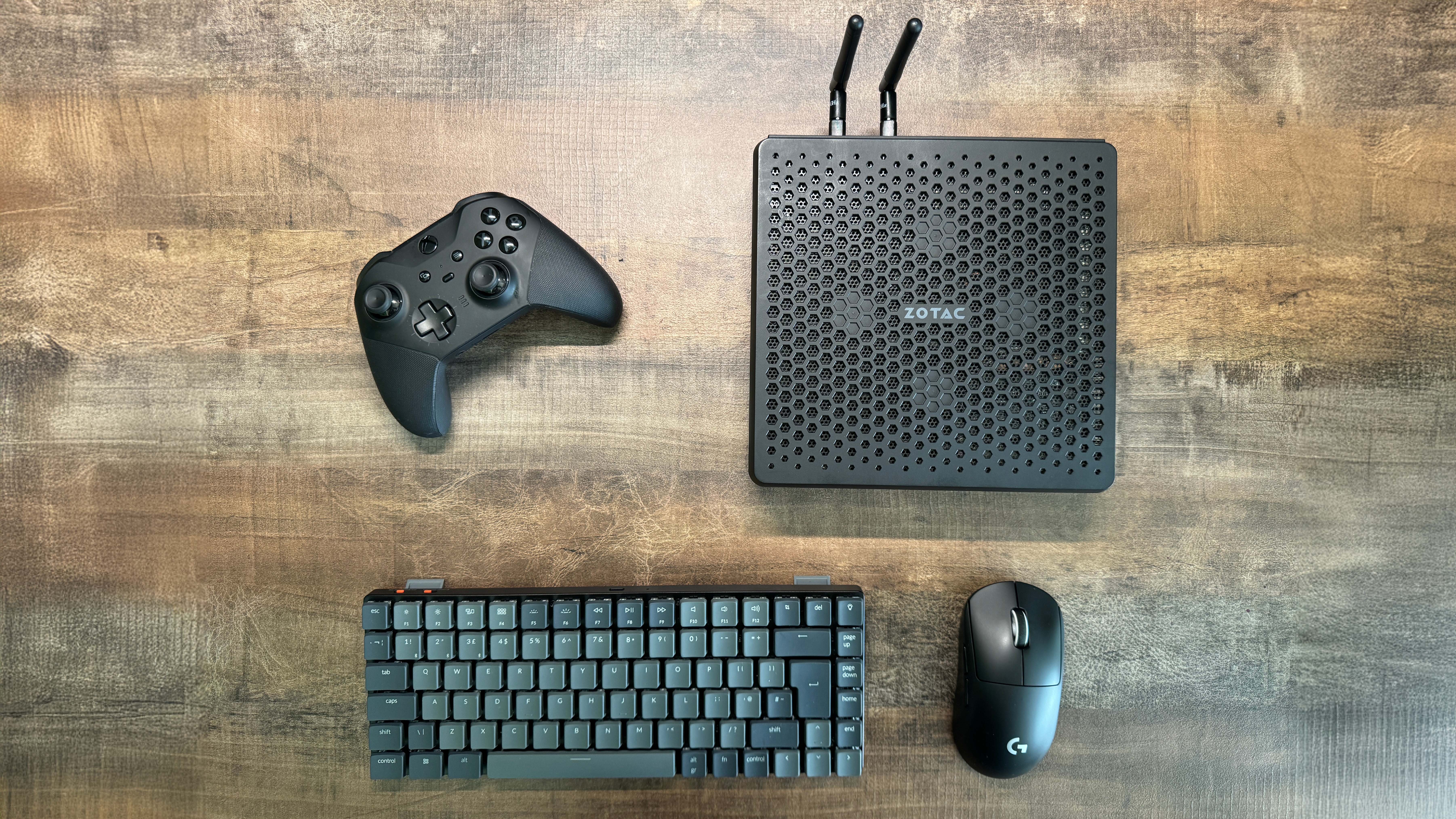 Zotac Zbox Magnus EN374070C mini PC on a wooden background