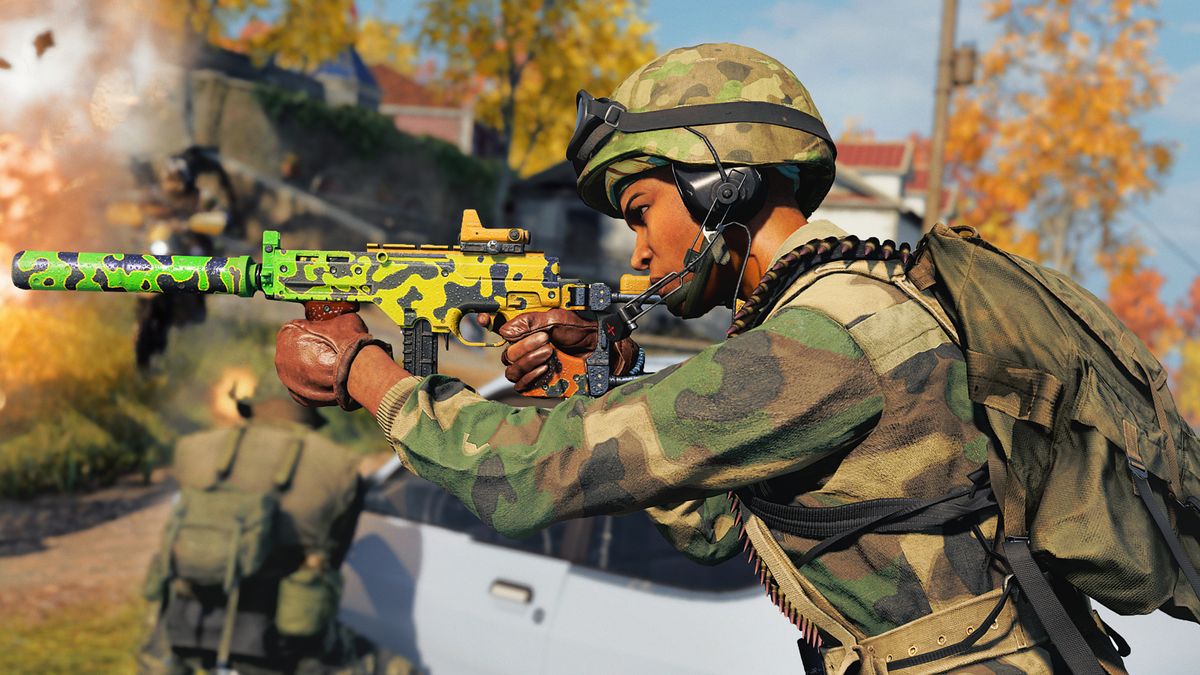 soldier holding a camo-covered smg