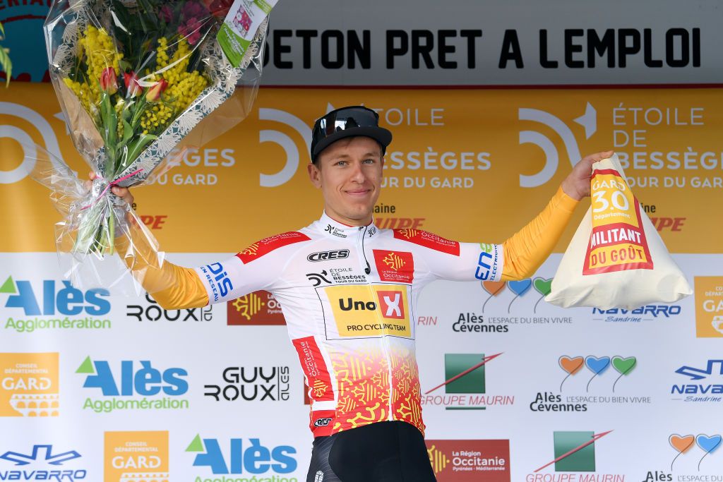 ROUSSON FRANCE FEBRUARY 03 Tobias Halland Johannessen of Norway and UNO X Pro Cycling Team celebrates winning the White Best Young Rider Jersey on the podium ceremony after the 52nd toile De Bessges Tour Du Gard 2022 Stage 2 a 156km stage from SaintChristollesAls to Rousson 304m EtoiledeBesseges EDB2022 on February 03 2022 in Rousson France Photo by Luc ClaessenGetty Images