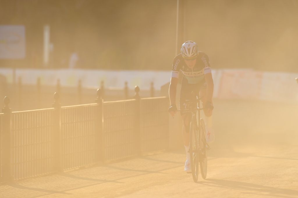 An Etixx-Quick Step rider in the dust