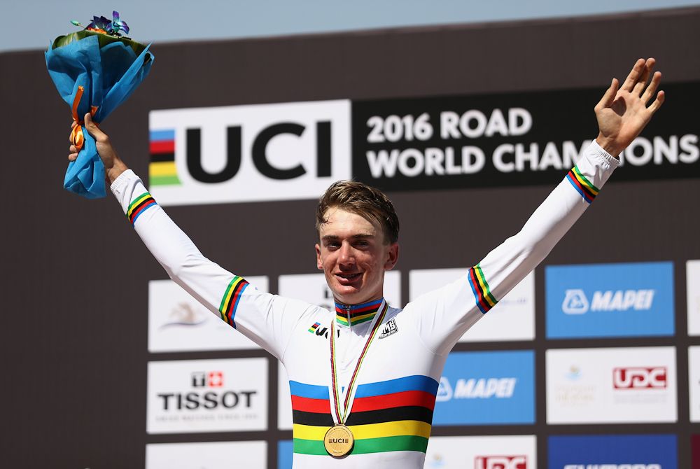 US gold medallist Brandon McNulty celebrates on the podium at the end of the men's junior individual time trial
