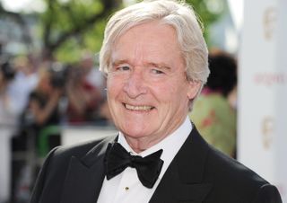 Coronation Street star Bill Roache on the red carpet in a suit