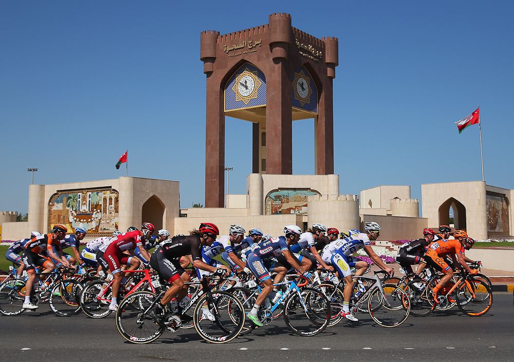 The peloton passes through the outskirts of Muscat during stage two of the 2016 Tour of Oman