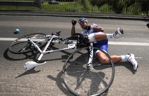 Saur Sojasun's Rony Martias, already sporting bandages from a previous crash, broke his fork right off his bike.