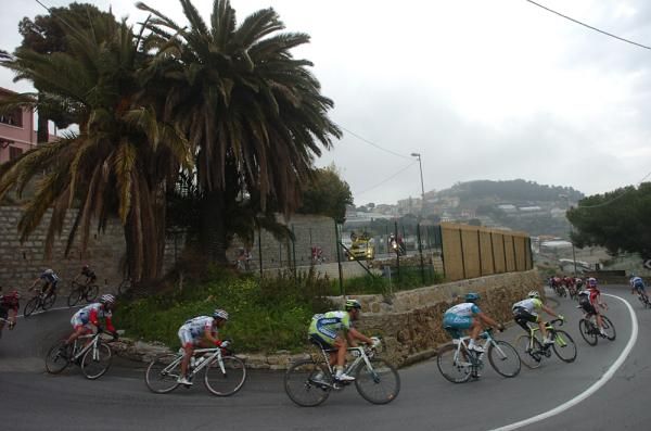 The descents stretch the peloton into a long, thin line.
