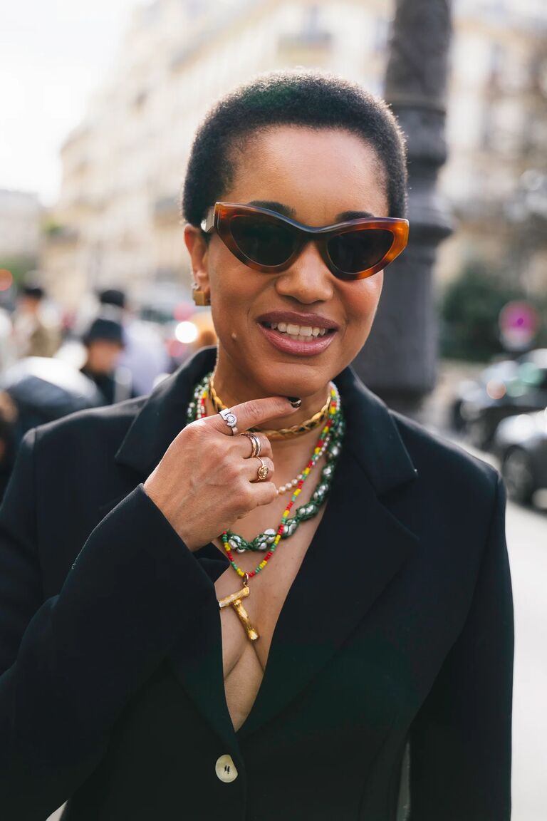 tamu mcpherson wearing beaded necklaces at fashion week