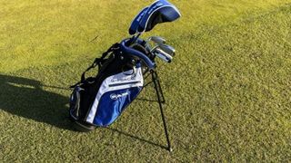 Ram G-Force Junior Set showing off its blue and white bag resting on the golf course