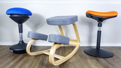 Three active chairs lined up against a wall