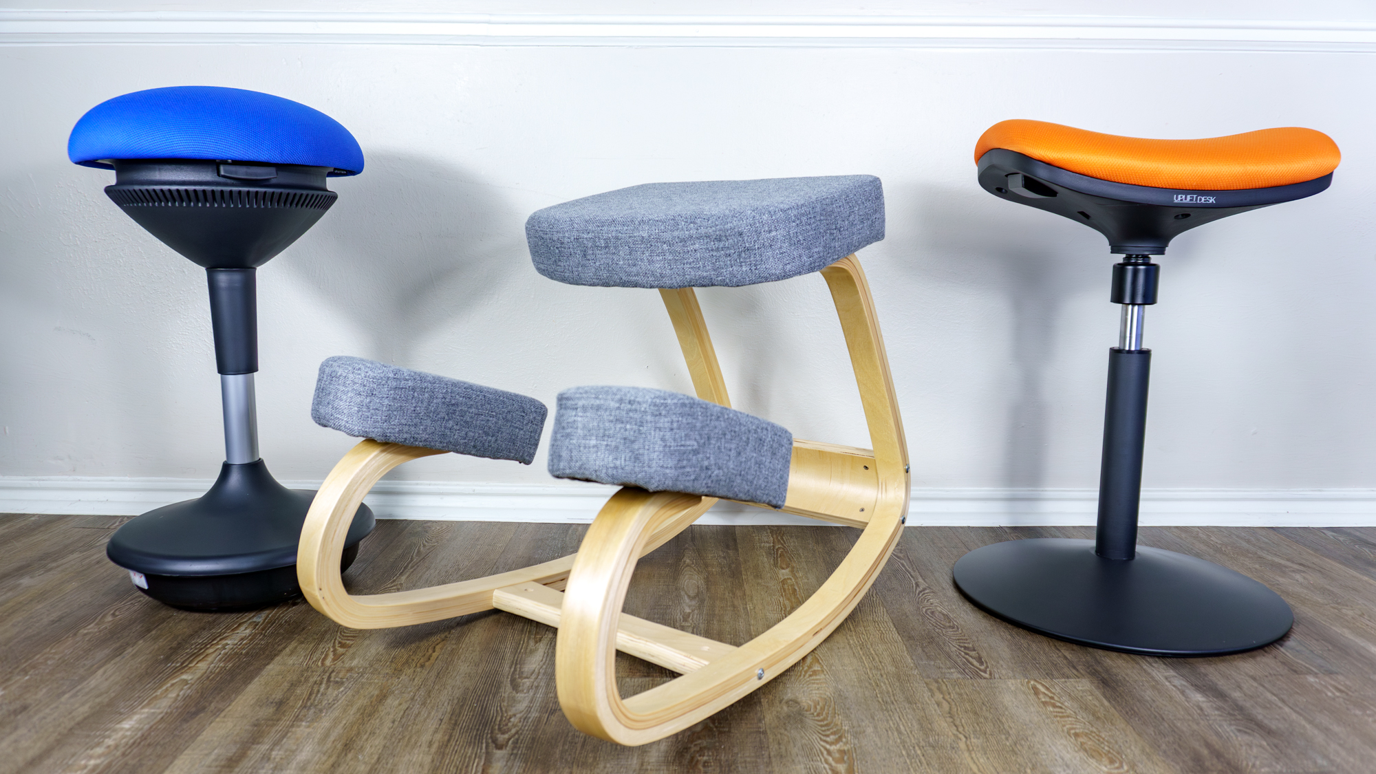 Three active chairs lined up against a wall