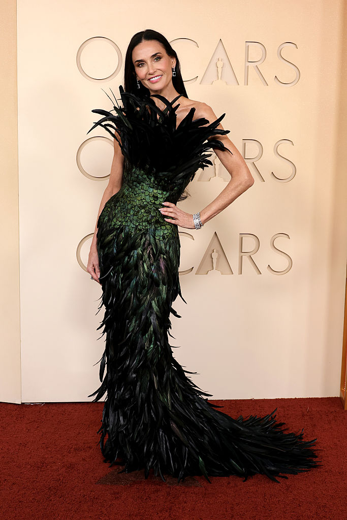 Demi moore wears a Gucci feather gown at the 2026 Oscars