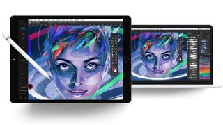 Drawing tablet with Photoshop used to paint a woman's face