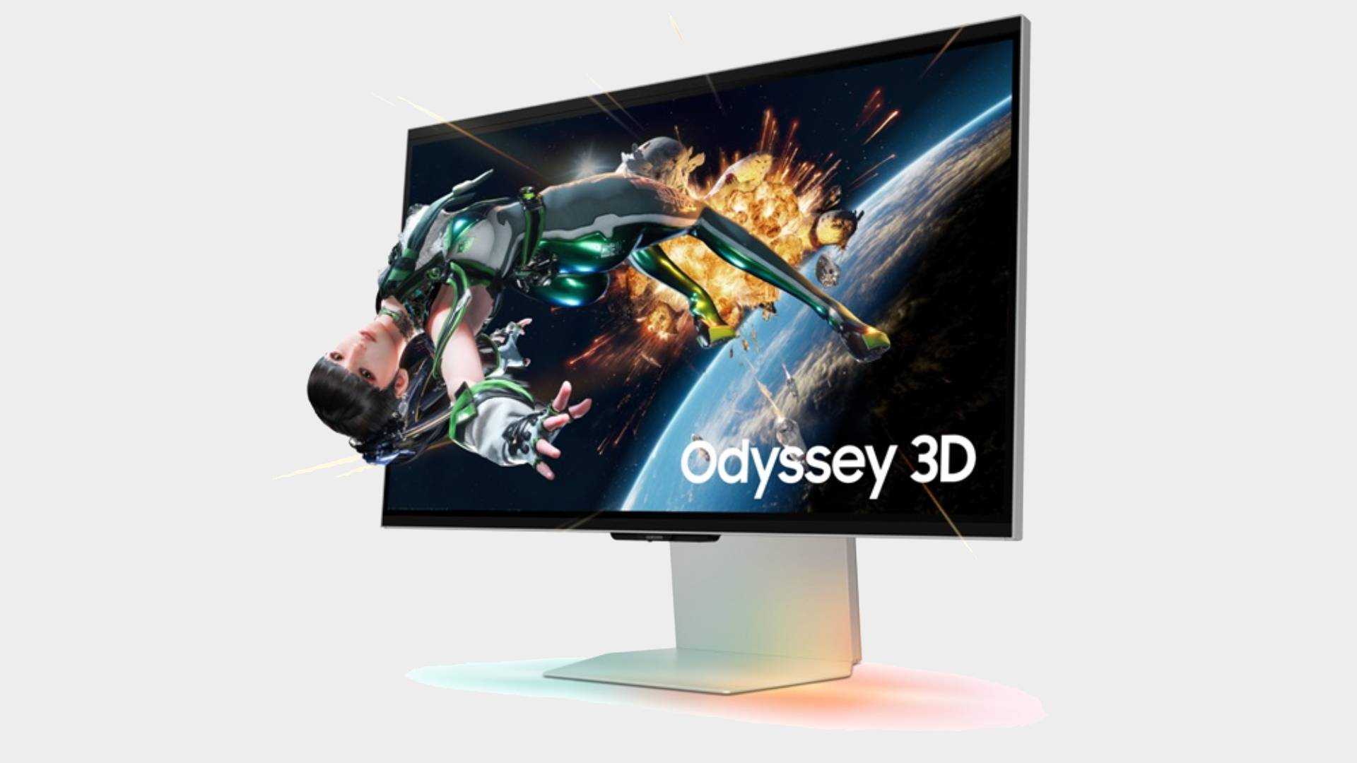 Samsung Odysse G90XF 3D monitor with Stellar Blade promotional art on screen.