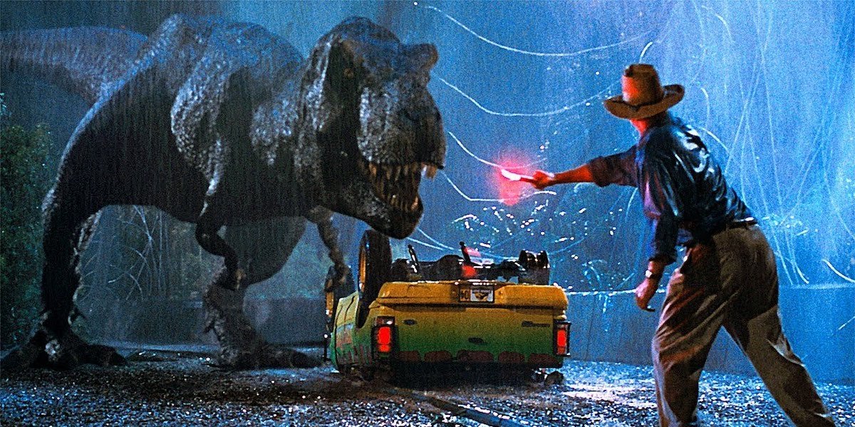 Dr. Grant waves a flare in front of the T-Rex in &#039;Jurassic Park&#039;