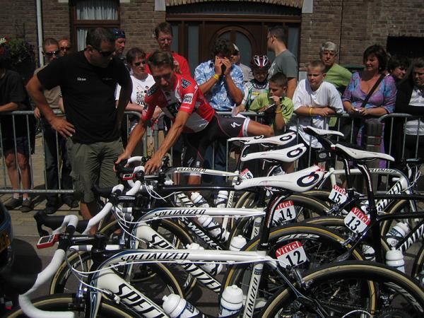 Danish champion Nicki S&ouml;rensen checks out his bike before the start