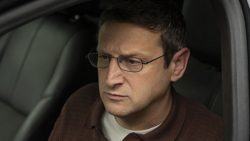 Ron Trosper frustrated sitting in his car in The Chair Company