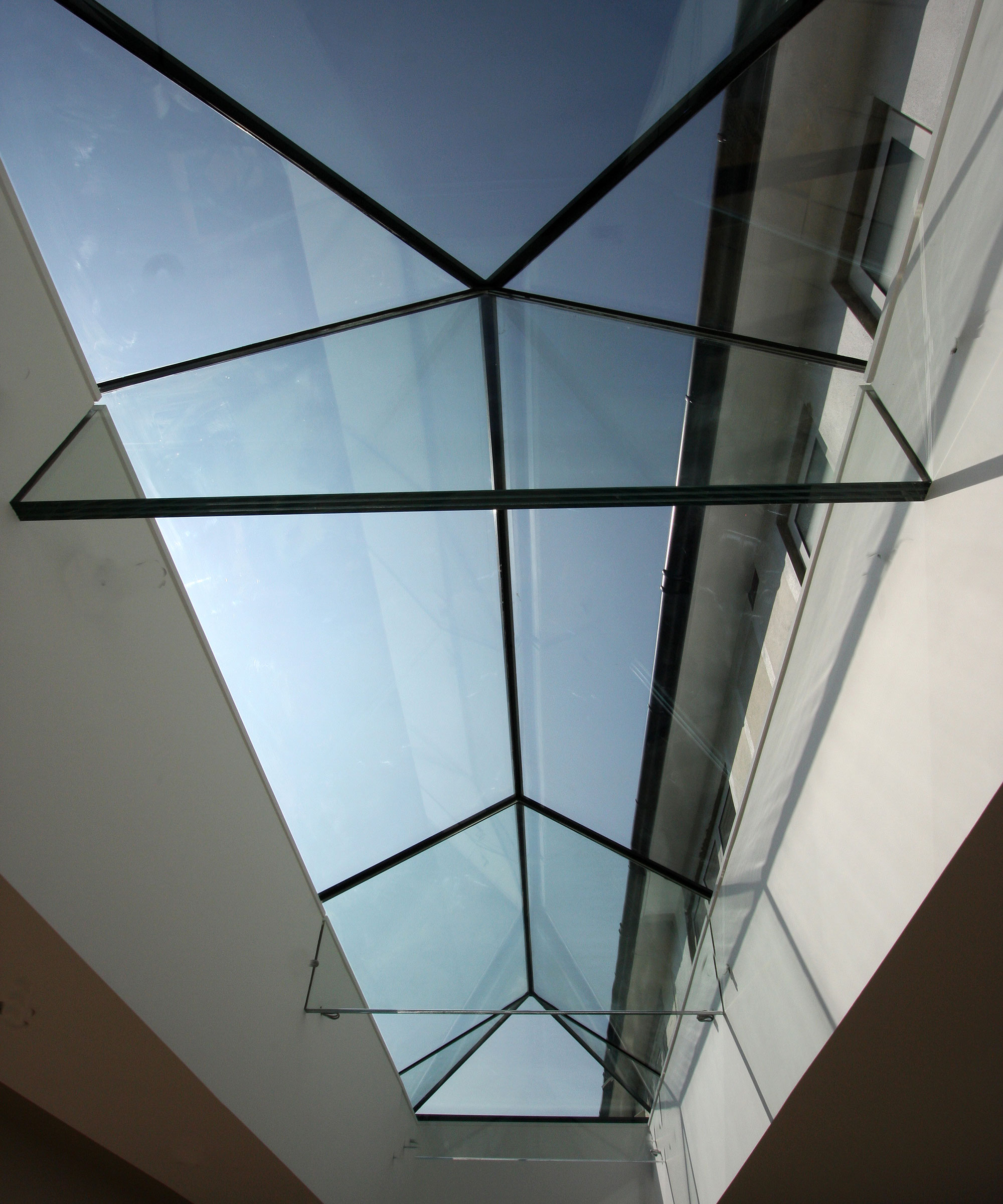 inside of a large frameless roof lantern