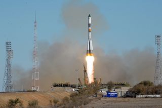 A Soyuz rocket carrying the Progress 45 cargo ship lifts off from a pad at Baikonur Cosmodrome in Kazakhstan on Oct. 30, 2011.