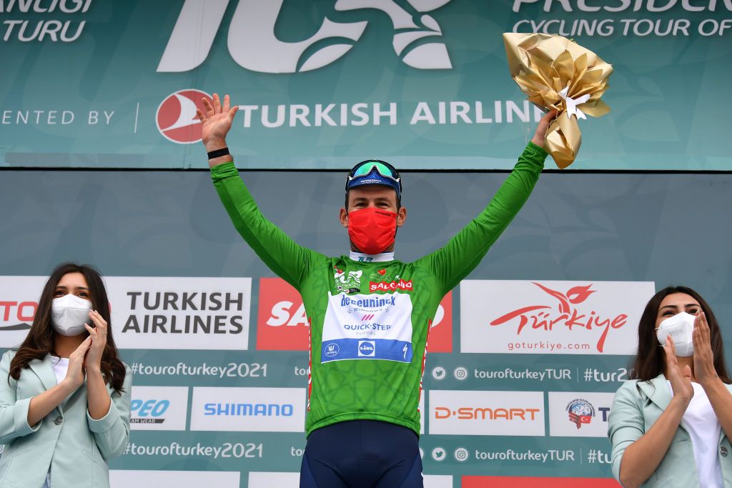 KEMER TURKEY APRIL 14 Podium Mark Cavendish of United Kingdom and Team Deceuninck QuickStep Green Points Jersey Celebration during the 56th Presidential Cycling Tour Of Turkey 2021 Stage 4 a 1844km stage from Alanya to Kemer TUR2021 tourofturkeyTUR on April 14 2021 in Kemer Turkey Photo by Stuart FranklinGetty Images