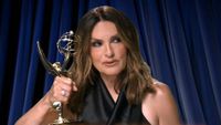 Mariska Hargitay holding an Emmy trophy up to her head like a telephone in 2026 Emmys promo