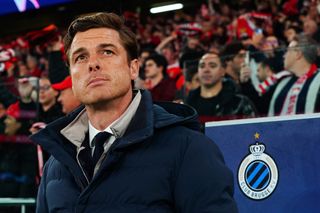 Club Brugge coach Scott Parker looks on ahead of a game against Benfica in March 2023.